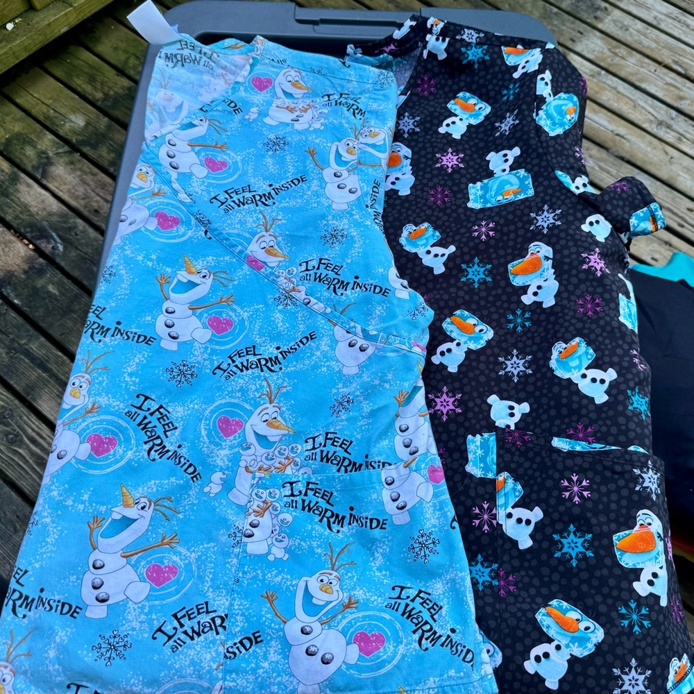 Two FROZEN’s Olaf Scrub Tops.  Perfect anytime of the year and during winter.